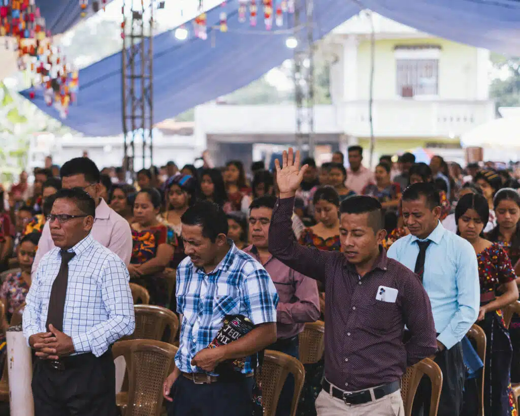 Community worshipping at Kiche Bible celebration.