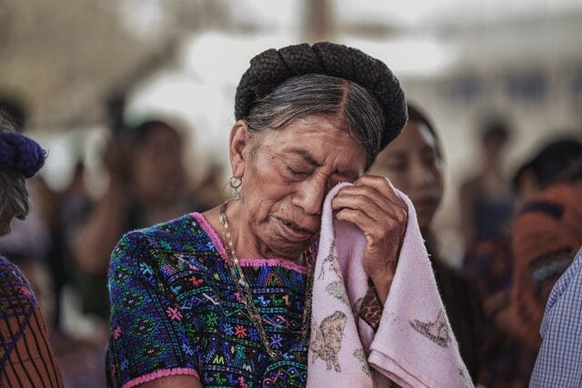 woman crying after receiving comforting bible verse